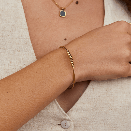 Brazalete de Cuentas de Oro